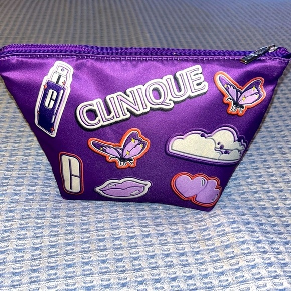 Clinique Handbags - Clinique Purple Cosmetic Bag